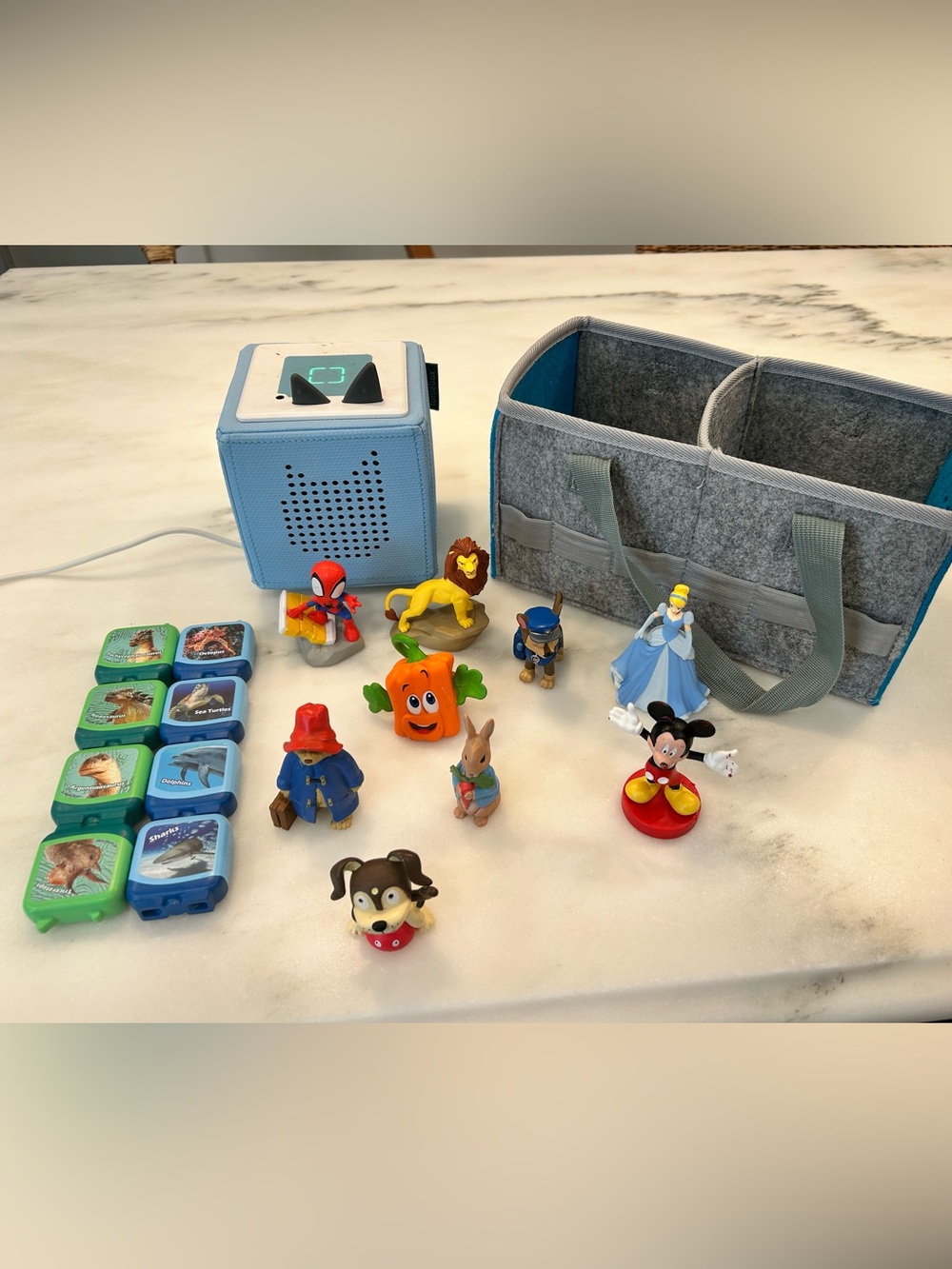 Tonies Blue Audio Speaker Box with Assorted Audio Experiences and blue Carry Cas